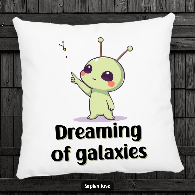 Funny pillow featuring an alien with expressive antennae pointing at a distant constellation, perfect for cosmic dreamers.