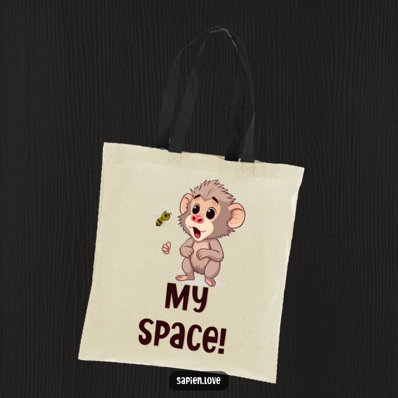 Funny Kawaii Baboon Tote Bag, a cute baboon startled by a buzzing insect, humorous and practical accessory.